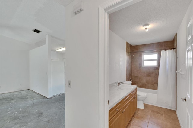 full bathroom with vanity, a textured ceiling, shower / tub combo with curtain, and toilet