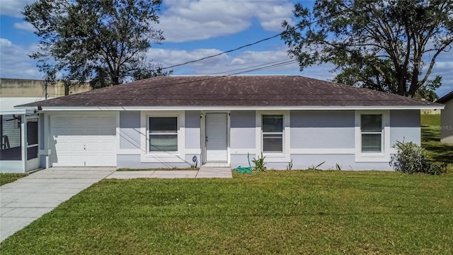 single story home featuring a front lawn and a garage