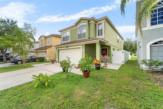 view of front facade with a front yard and a garage