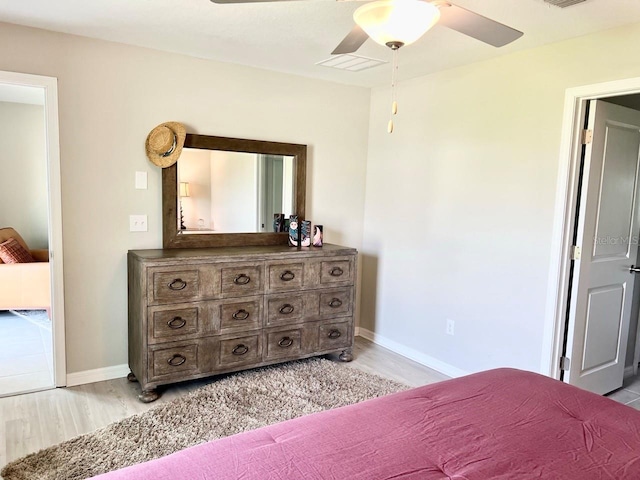 bedroom featuring ceiling fan and light hardwood / wood-style floors