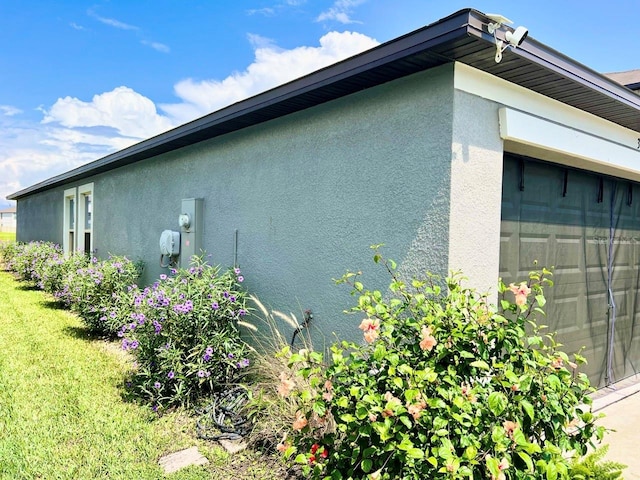 view of home's exterior with a yard