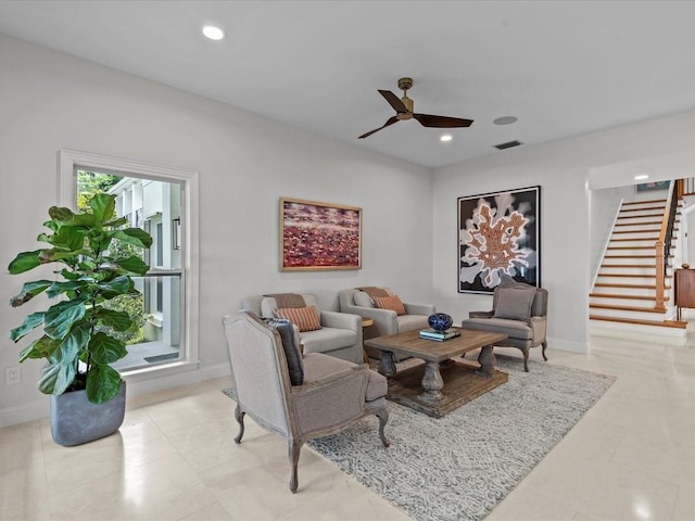 living room featuring ceiling fan