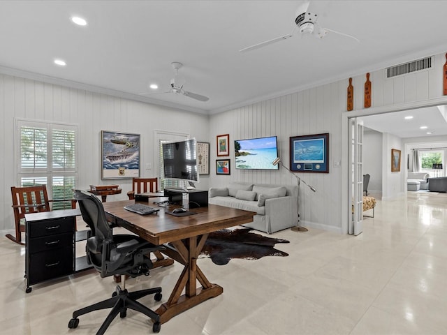 office area featuring wood walls, french doors, ornamental molding, and ceiling fan