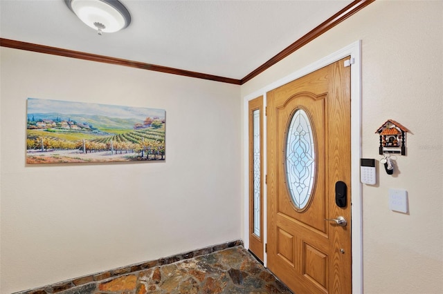 entryway featuring ornamental molding