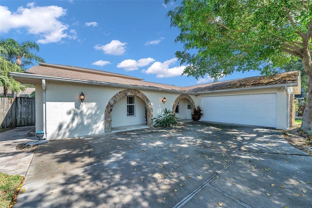 single story home with a garage