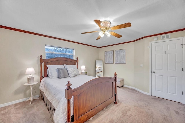 bedroom featuring baseboards, visible vents, light colored carpet, and ceiling fan