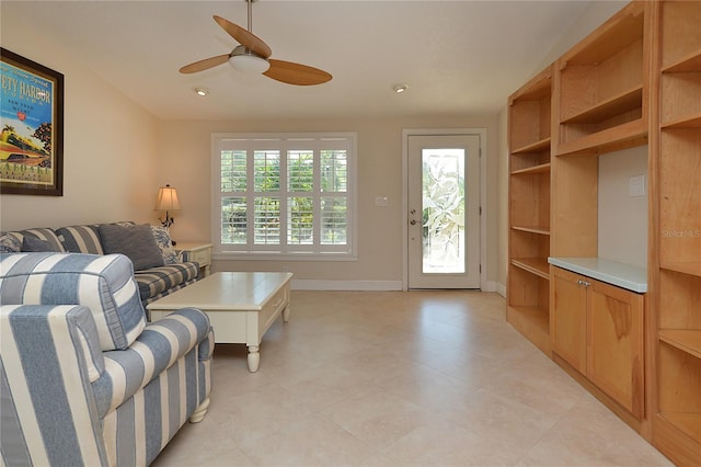 living room featuring ceiling fan