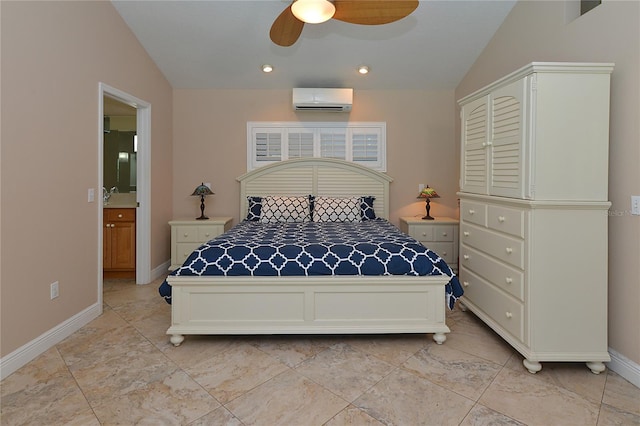 bedroom with ceiling fan, lofted ceiling, a wall unit AC, and ensuite bathroom