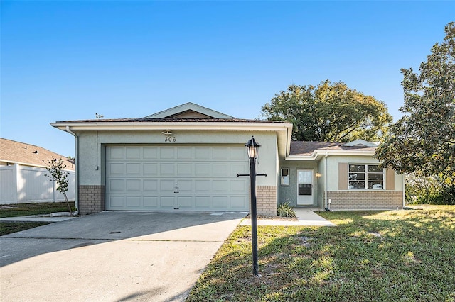 ranch-style house with a garage and a front lawn