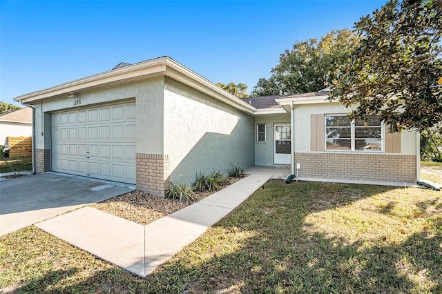 ranch-style house with a garage and a front lawn