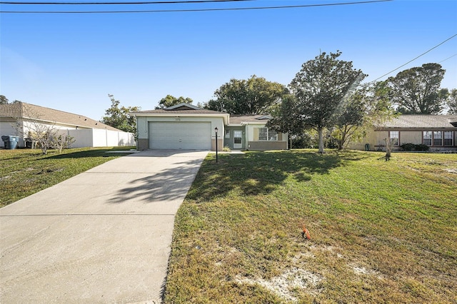 ranch-style home with a garage and a front yard