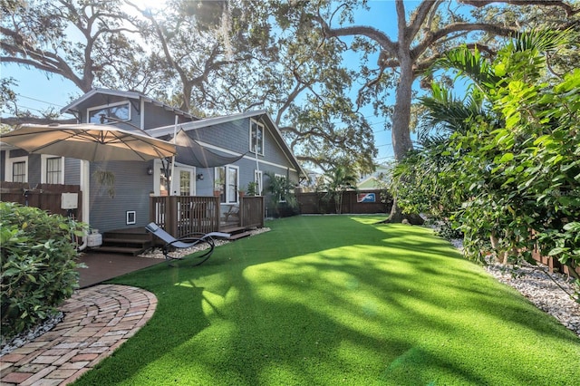 view of yard with a deck