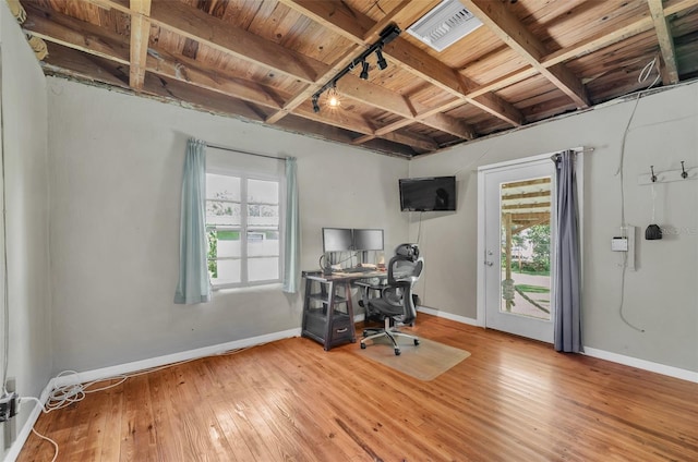 office with beamed ceiling, hardwood / wood-style flooring, and wooden ceiling