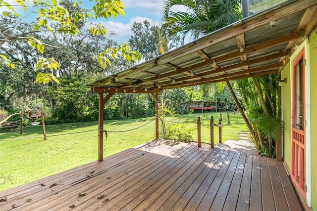 wooden deck with a yard