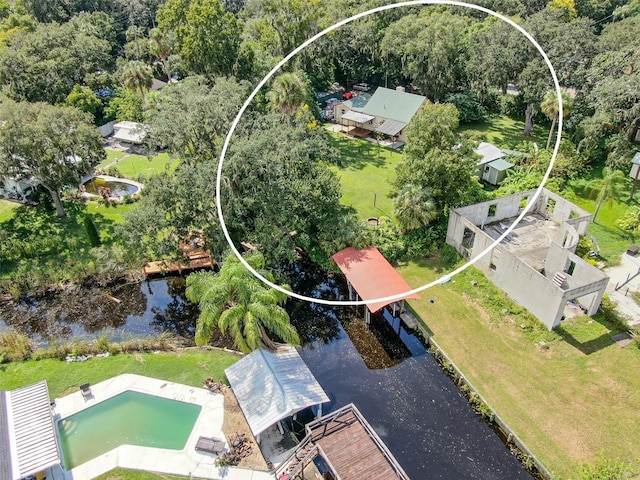 birds eye view of property featuring a water view