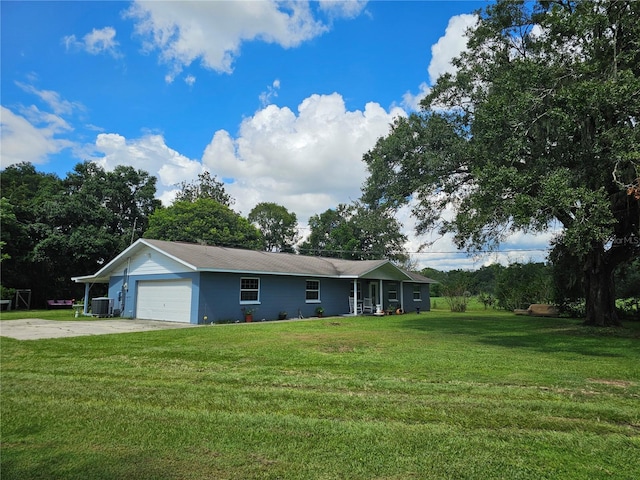 4810 N Galloway Rd, Lakeland, FL 33810 - view of front of house with a garage, a front lawn, driveway, and central AC unit