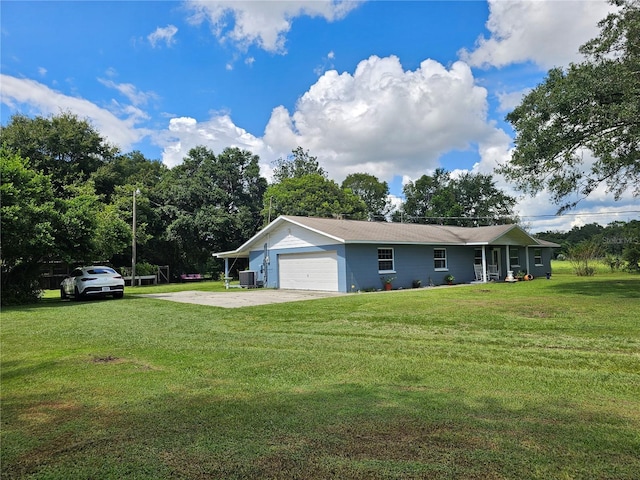 4810 N Galloway Rd, Lakeland, FL 33810 - view of property exterior with a yard, an attached garage, and concrete driveway