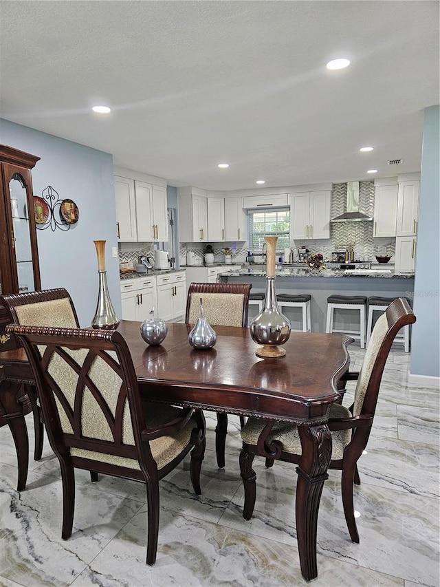4810 N Galloway Rd, Lakeland, FL 33810 - dining room featuring light marble finish flooring and recessed lighting