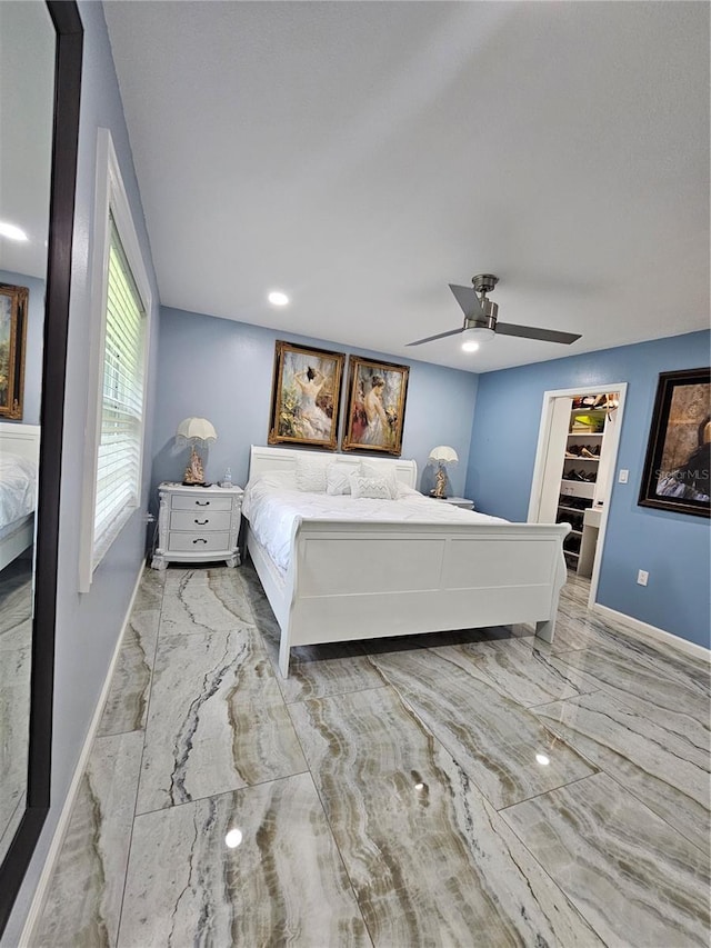 4810 N Galloway Rd, Lakeland, FL 33810 - bedroom featuring marble tiled floors, baseboards, a walk in closet, ceiling fan, and recessed lighting