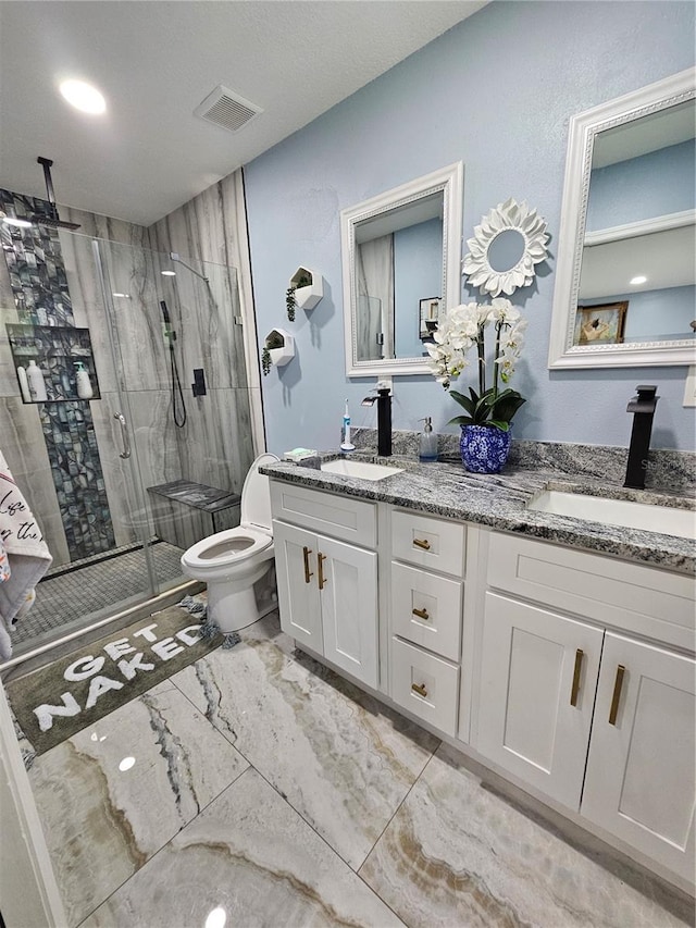 4810 N Galloway Rd, Lakeland, FL 33810 - full bath featuring toilet, a stall shower, and double vanity