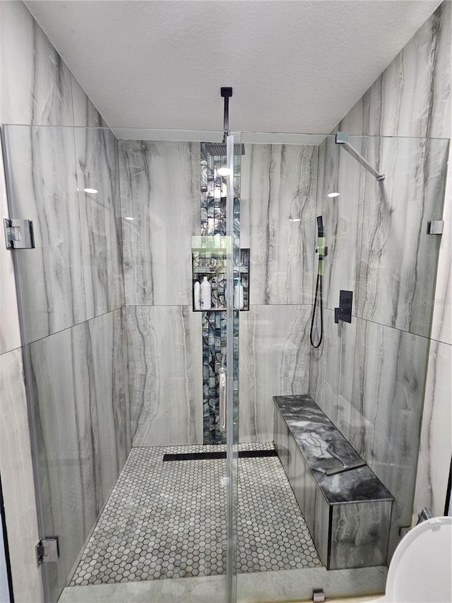 4810 N Galloway Rd, Lakeland, FL 33810 - bathroom with a marble finish shower and a textured ceiling