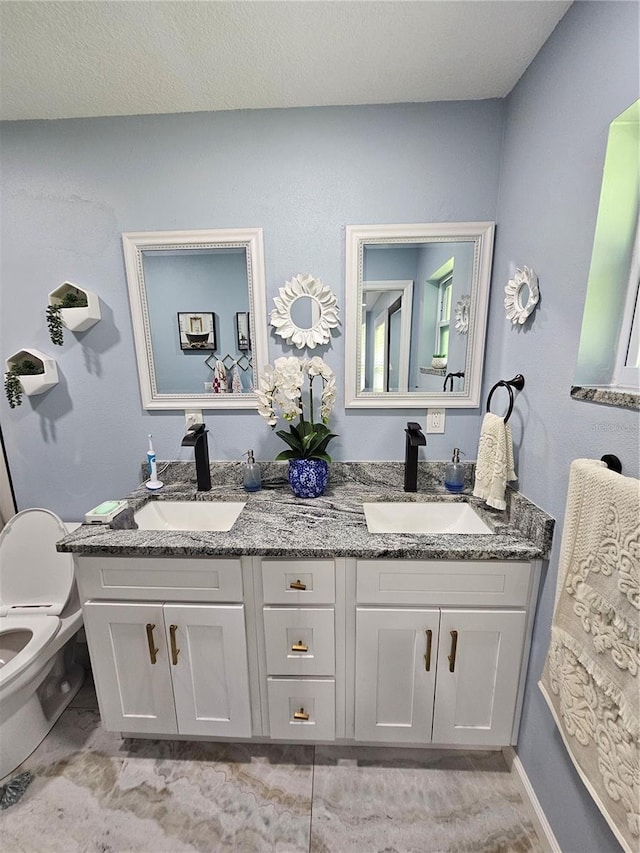 4810 N Galloway Rd, Lakeland, FL 33810 - full bathroom with double vanity and toilet