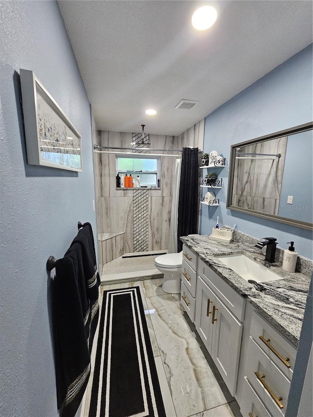 4810 N Galloway Rd, Lakeland, FL 33810 - bathroom with marble finish flooring, a stall shower, vanity, toilet, and recessed lighting
