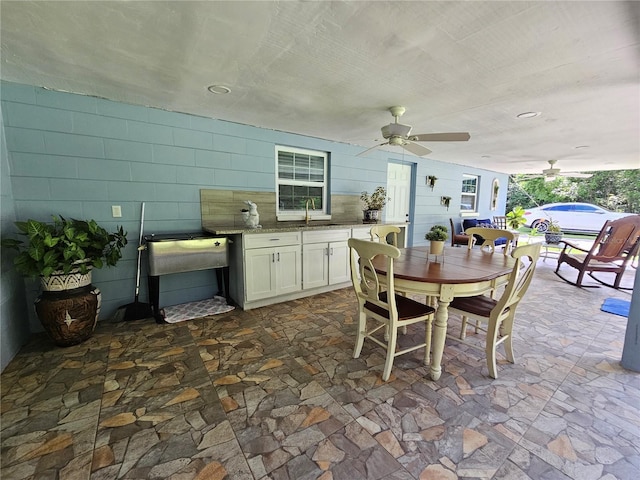 4810 N Galloway Rd, Lakeland, FL 33810 - view of patio featuring a ceiling fan, outdoor dining area, area for grilling, and a sink