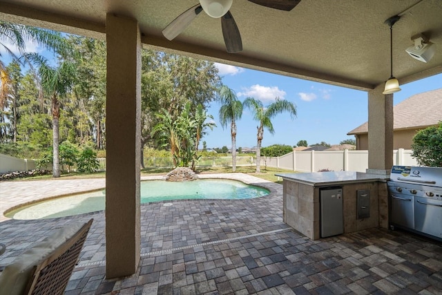 view of patio / terrace featuring a fenced in pool, ceiling fan, and a grill