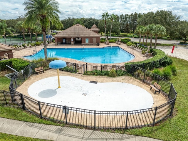 view of swimming pool with a patio