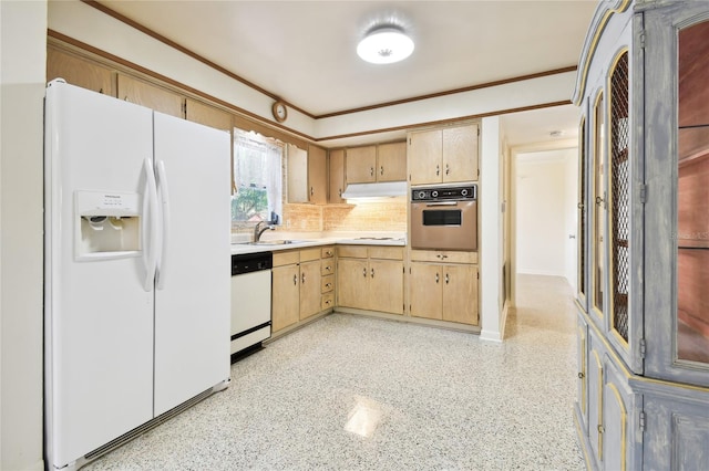 kitchen featuring light brown cabinetry, backsplash, sink, and white appliances