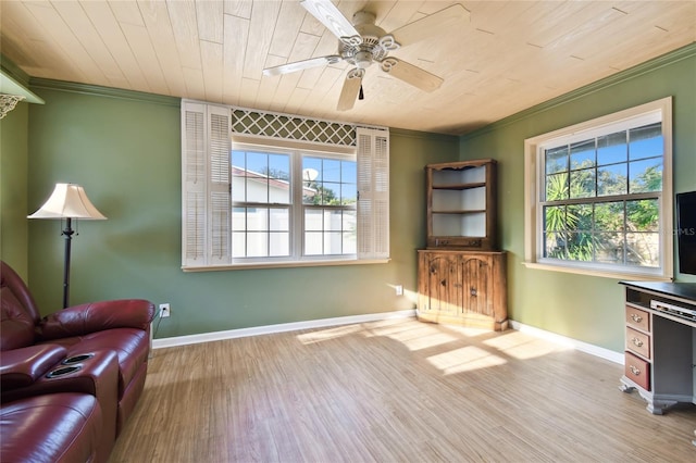 living area featuring crown molding, wood ceiling, ceiling fan, and light hardwood / wood-style flooring