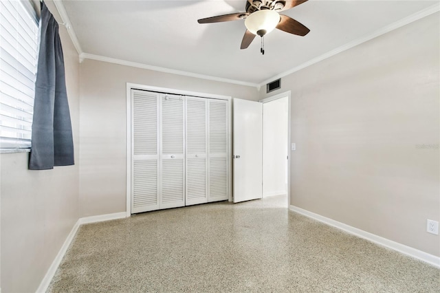 1756 Ashton Abbey Rd, Clearwater, FL 33755 - unfurnished bedroom featuring baseboards, ornamental molding, visible vents, and speckled floor