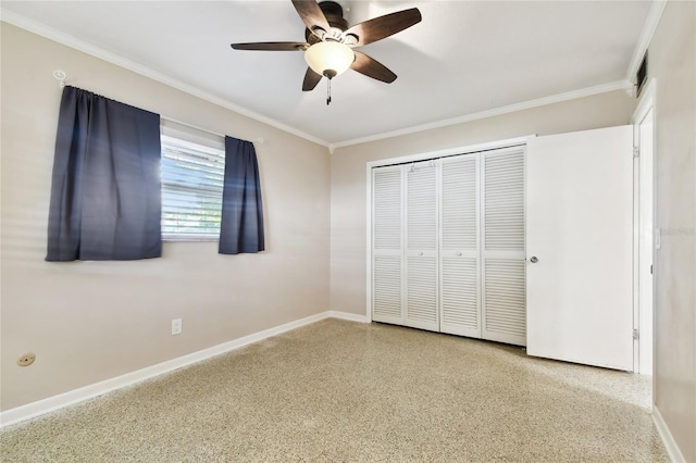 unfurnished bedroom featuring crown molding, ceiling fan, and a closet