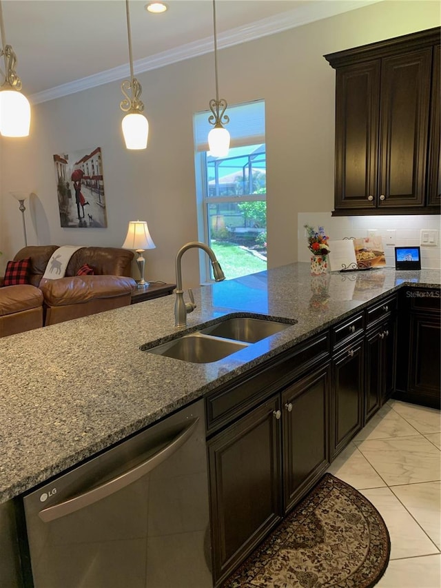 kitchen featuring pendant lighting, sink, dishwasher, ornamental molding, and dark stone counters