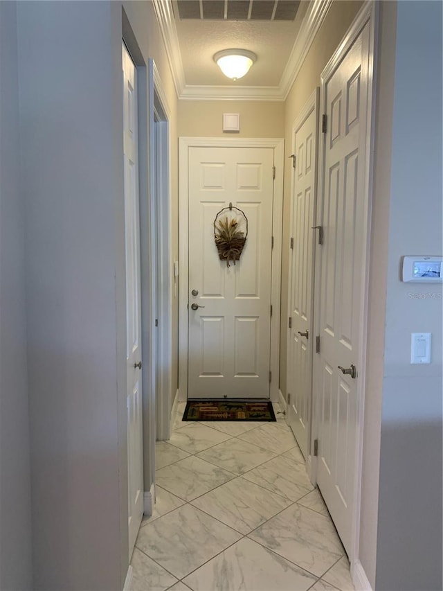 16015 Cape Coral Dr, Wimauma, FL 33598 - entryway with light marble finish floors, baseboards, and ornamental molding