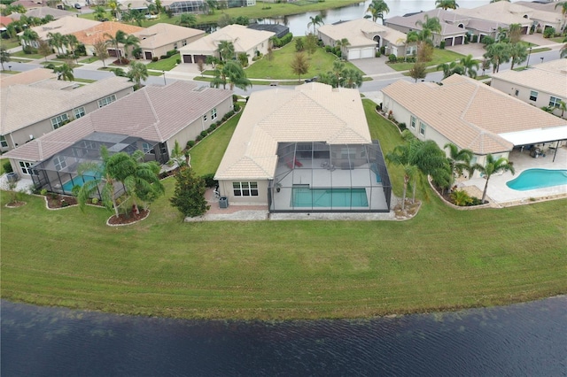16015 Cape Coral Dr, Wimauma, FL 33598 - aerial perspective of suburban area featuring a pool area and a large body of water