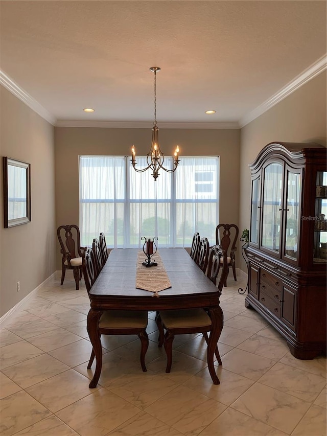 dining area with a notable chandelier and crown molding