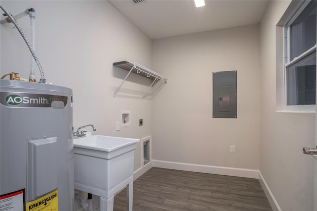 washroom featuring electric dryer hookup, washer hookup, dark wood-type flooring, electric water heater, and electric panel