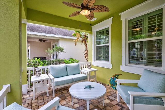 view of patio / terrace featuring an outdoor living space and ceiling fan