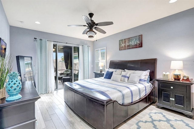 bedroom with light wood-type flooring, ceiling fan, and access to outside