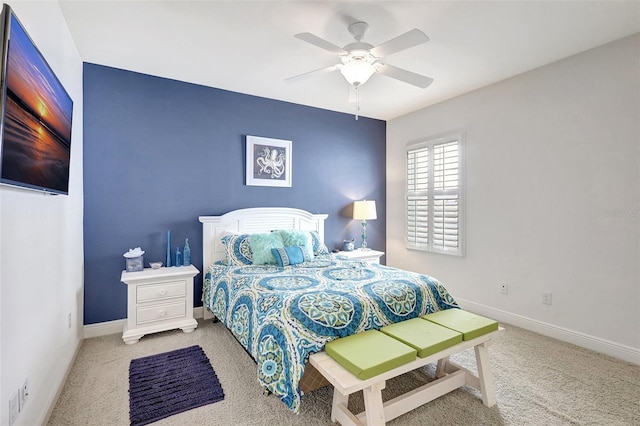 bedroom with ceiling fan and carpet