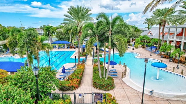 view of swimming pool with a patio