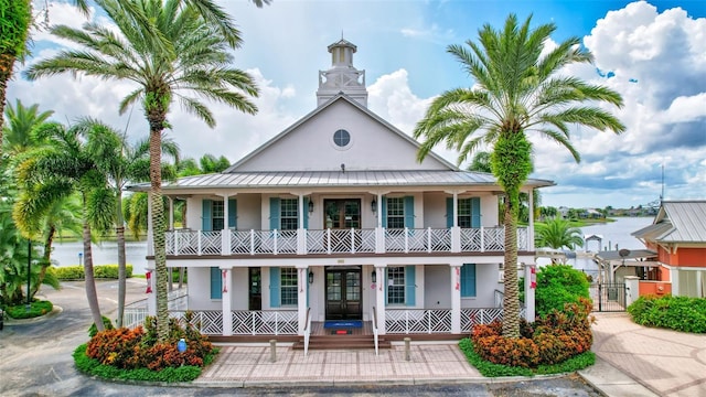 view of property with a water view