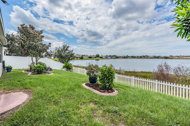 view of yard with a water view