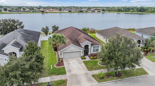 drone / aerial view with a water view