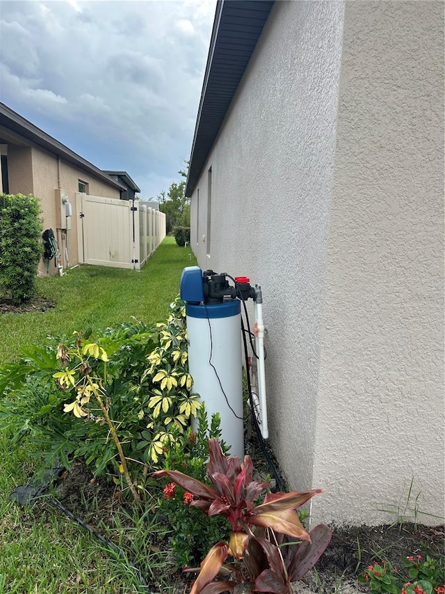 view of home's exterior featuring a lawn