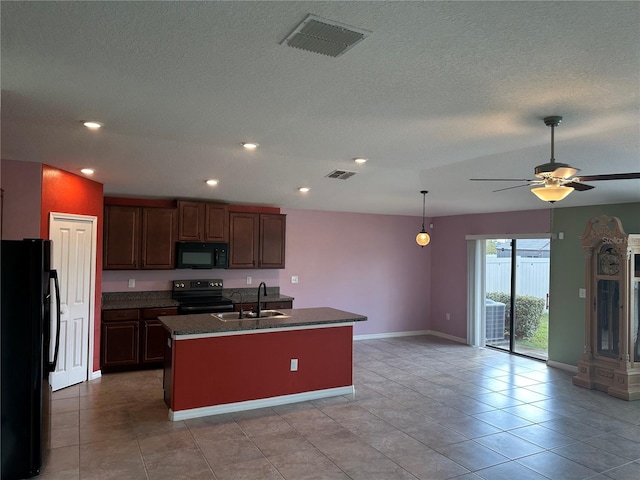 kitchen with a kitchen island with sink, ceiling fan, sink, and black appliances