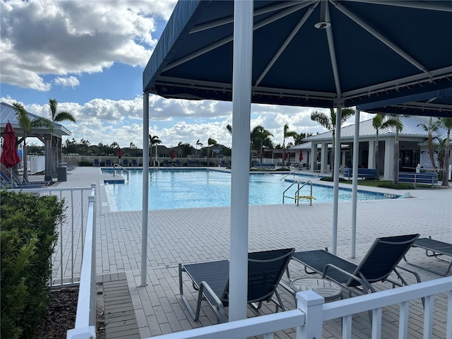 view of pool featuring a patio area and a gazebo