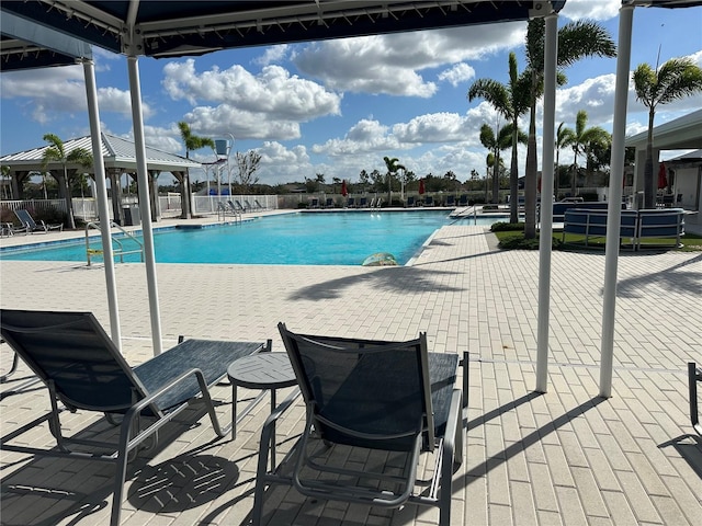 view of pool with a patio area and a gazebo